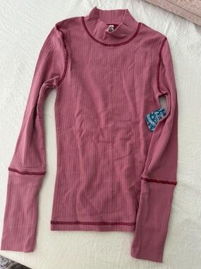 Free People Ribbed Mock Neck Long Sleeve Top in Raspberry Pink